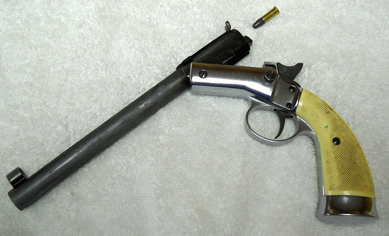 Hawes Favorite, open, with .22 LR cartridge